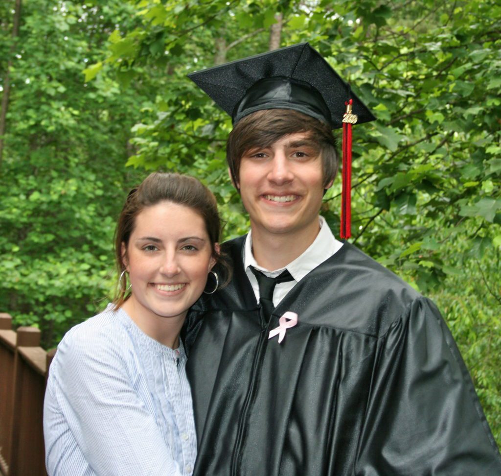 tall boy with a graduation cap and gown on standing next to a girl | is going to college the right choice | Positively Jane