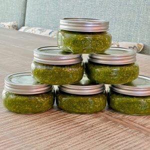 jars of pesto stacked on top of each other