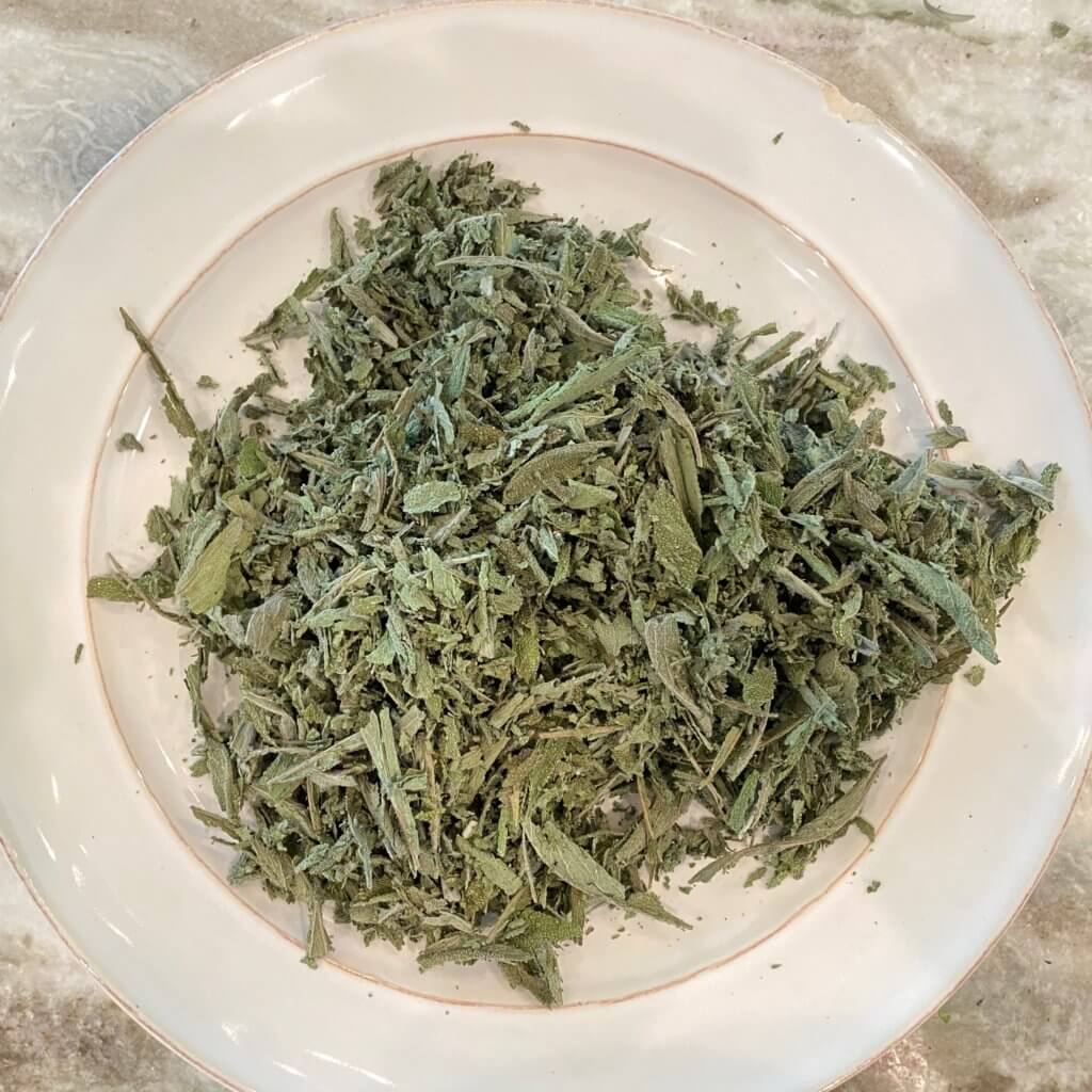 crumbled herbs on a plate