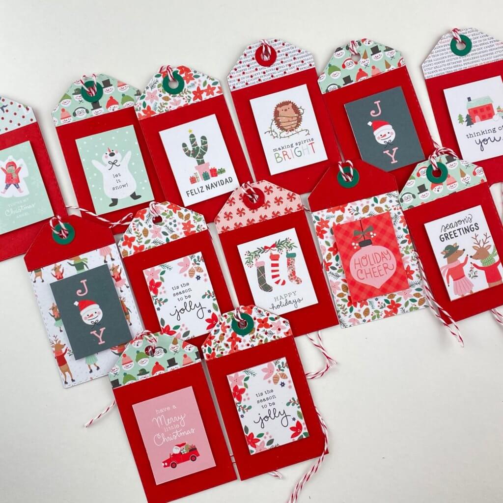 pattern paper gift tags lined up on a desk