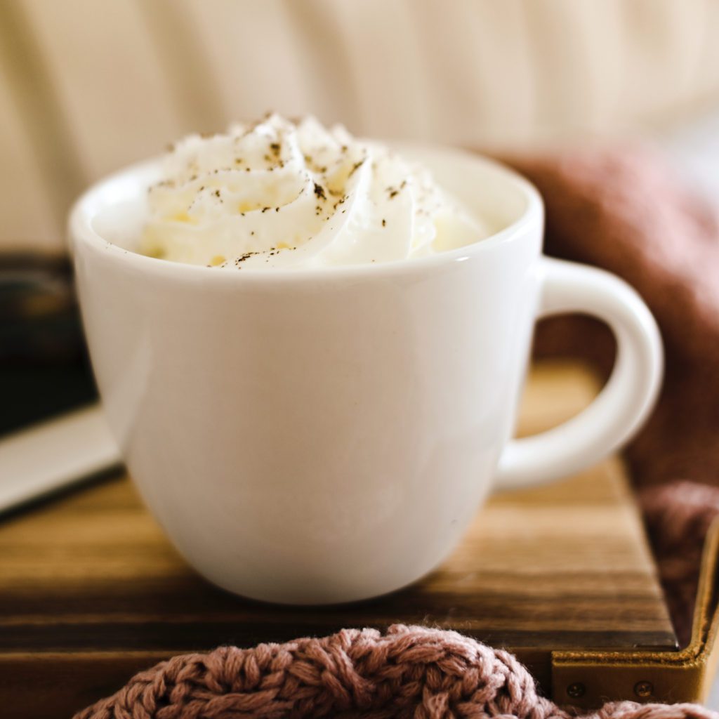 hot chocolate with whipped cream on top in a white mub | autumn blessings 1 | Positively Jane