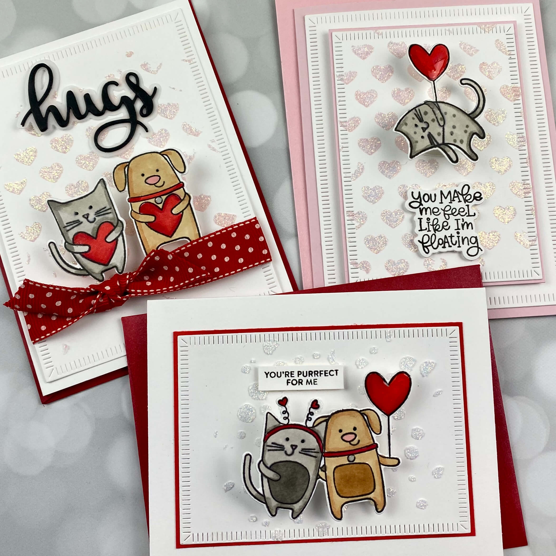 hand made cards with hand colored cats and dogs that shake