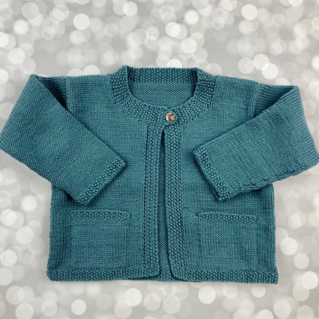 Hand knit dark blue sweater with pockets