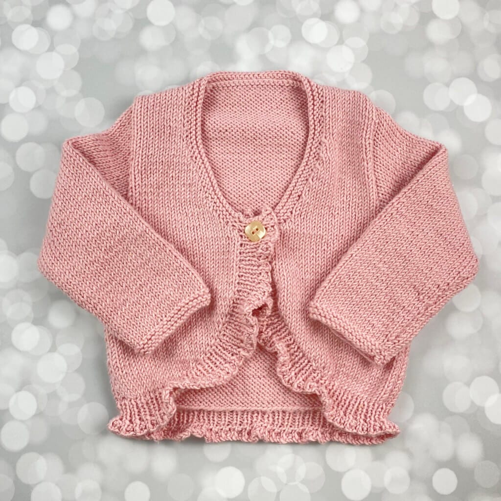 handmade pink sweater with ruffles