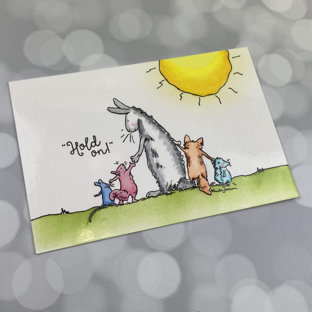 handmade card with critters holding hands