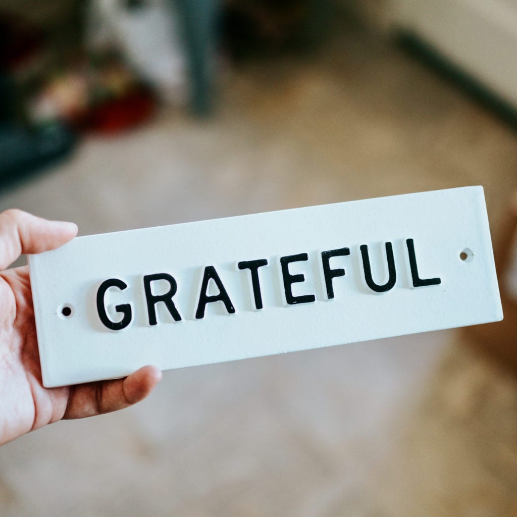 the word grateful on a sign