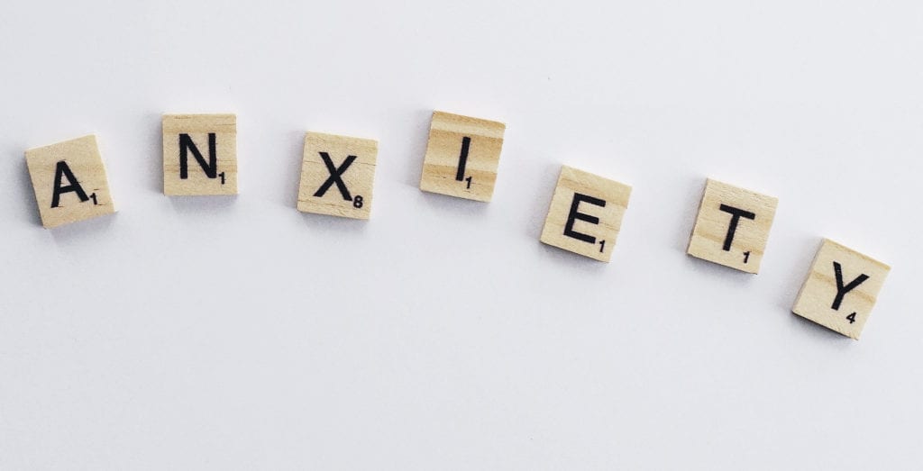anxiety spelled out with scrabble tiles