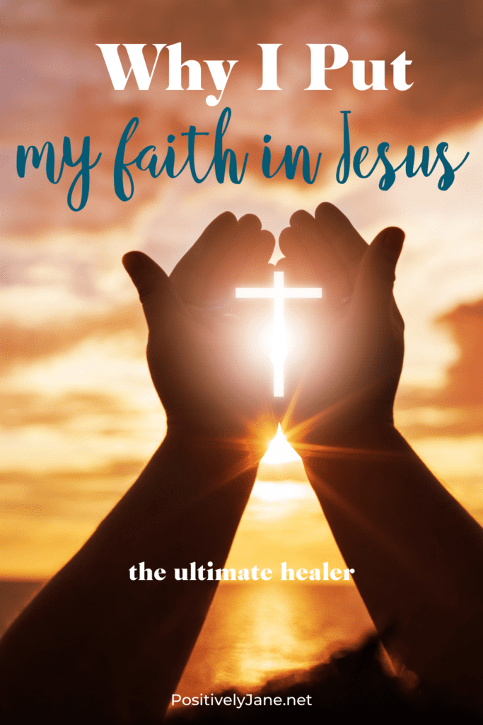 Hand in the air up to the sunrise and a cross is peeking through the hands | faith in Jesus | Positively Jane