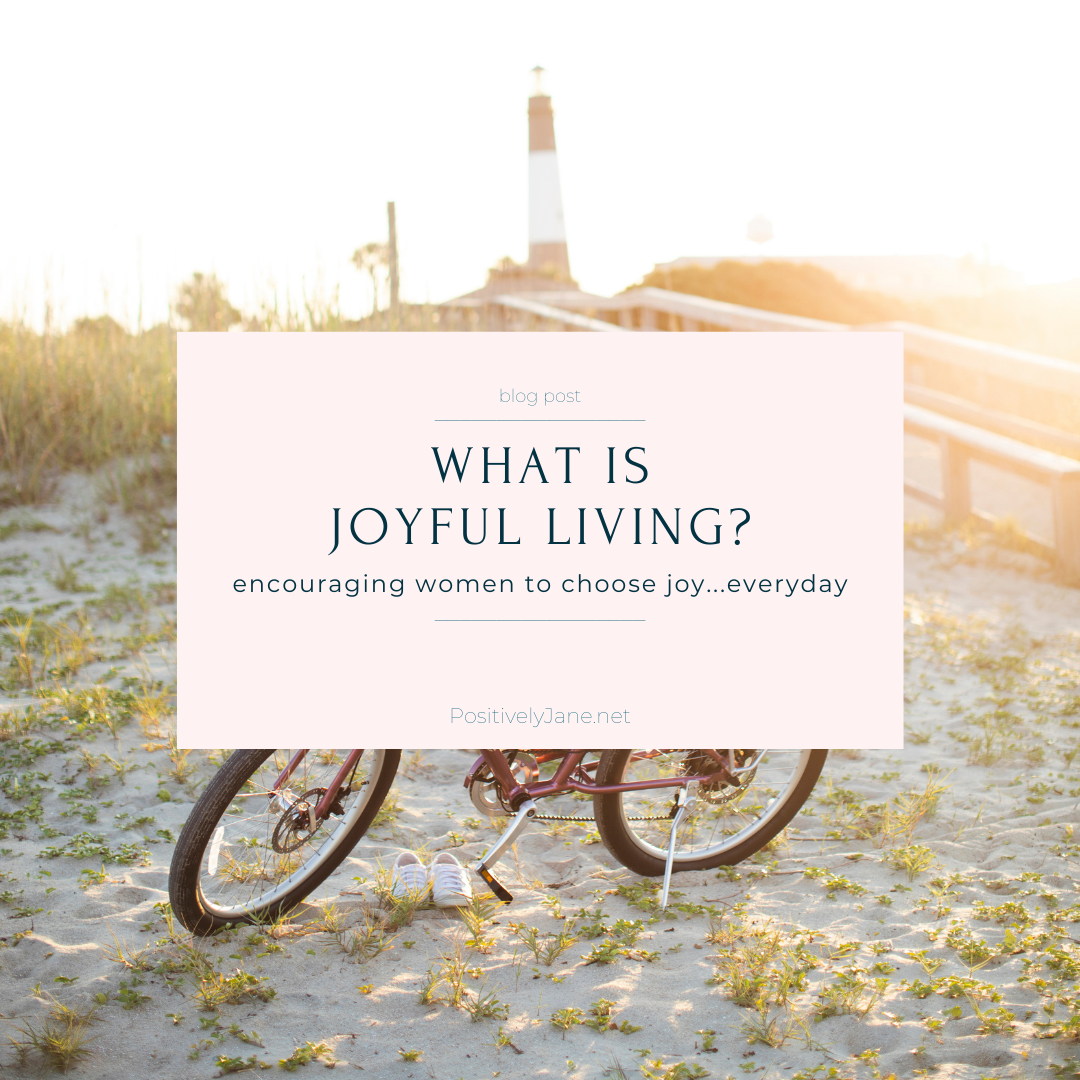 what is joyful living text over a bike on the beach