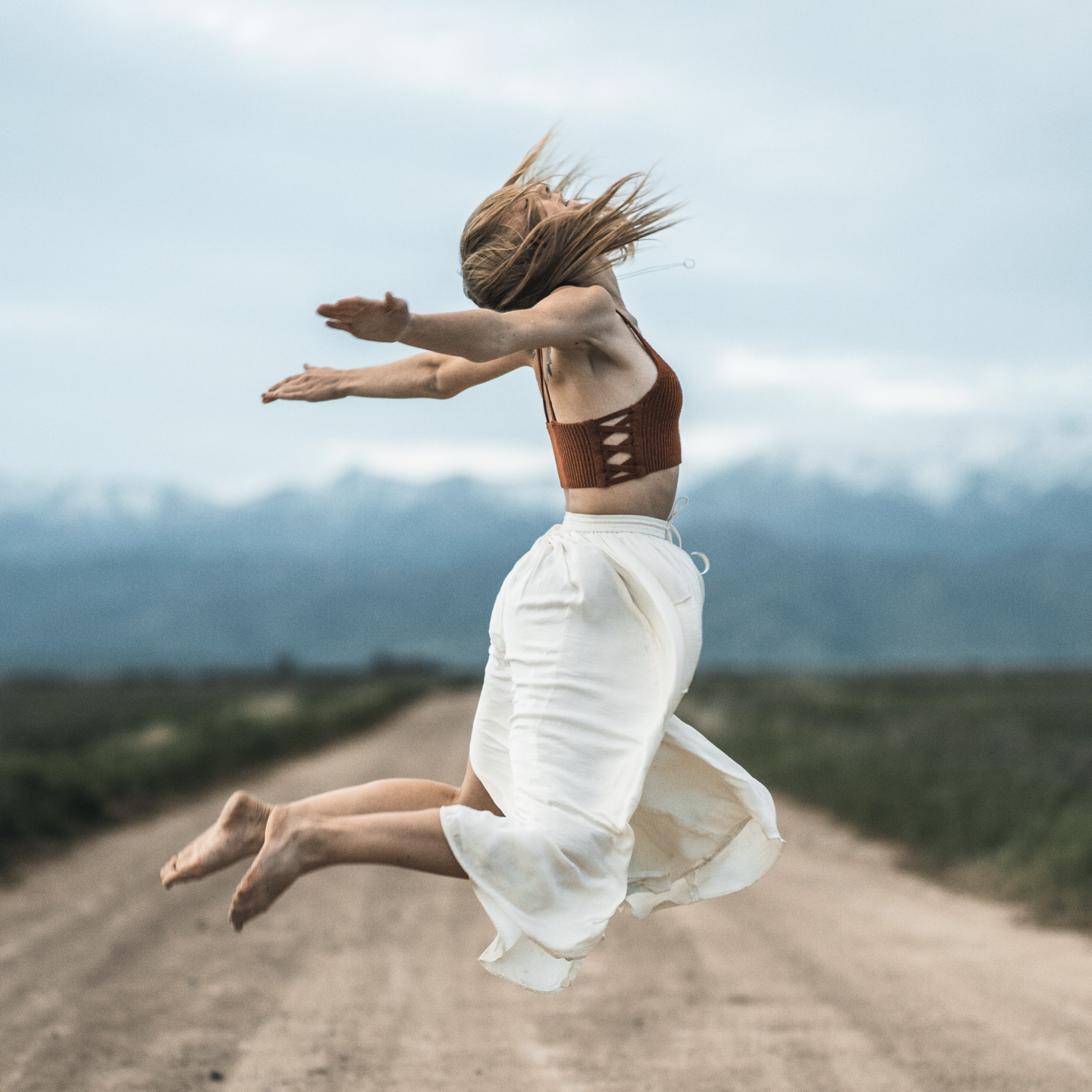 girl jumping for joy