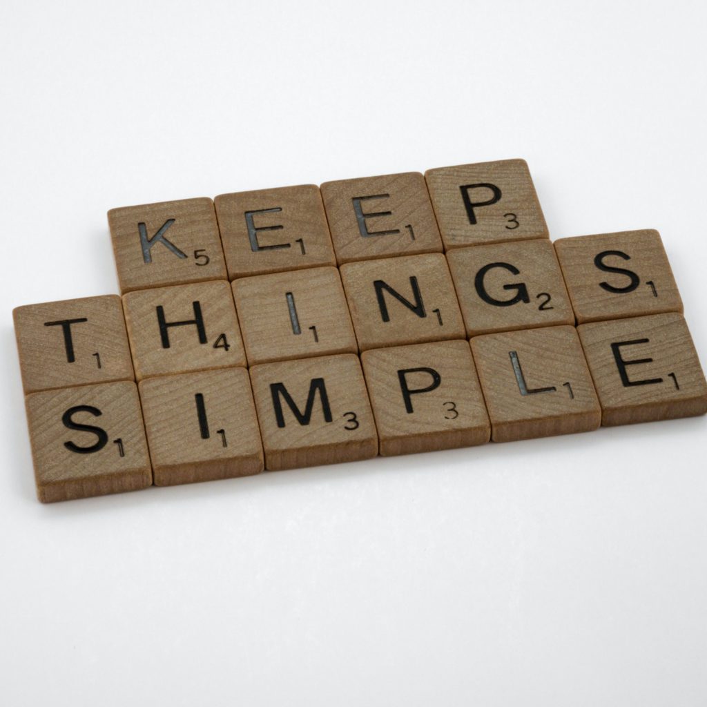keep things simple written on scrabble tiles | eliminate the overwhelm | the 5 minute declutter | Positively Jane